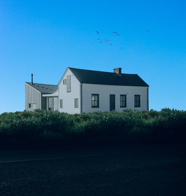 A house on a landwith another sky